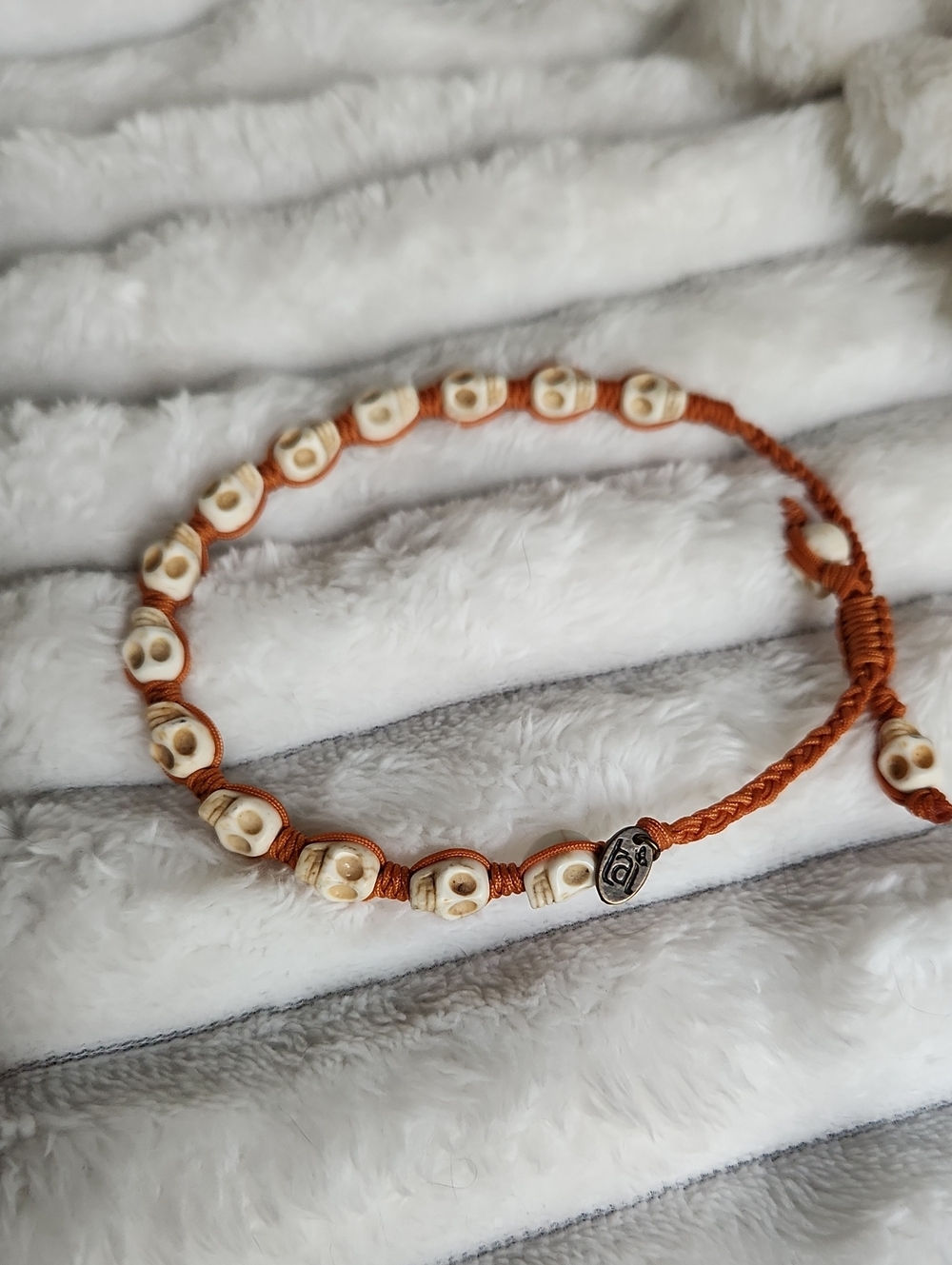 Taj Brand Orange Weave Beaded Skull Bracelet